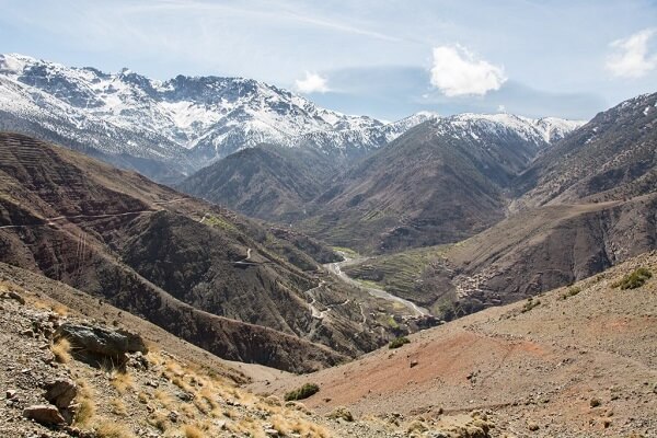 green valley and snowy mountains in morocco