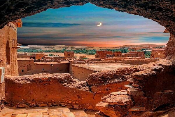 moon and old buildings