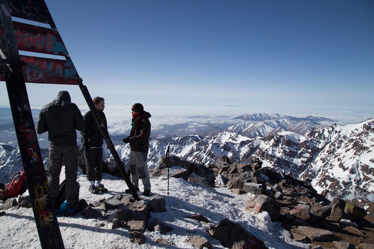 people at the summit of mount toubkal
