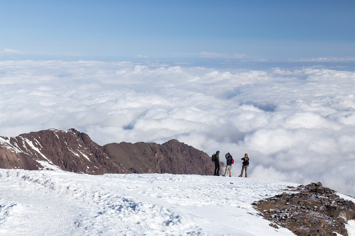 view toubkal summit people over the clouds