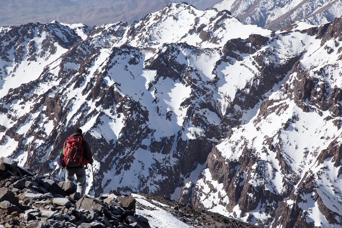 walking down mount toubkal people walking in mountain ridge