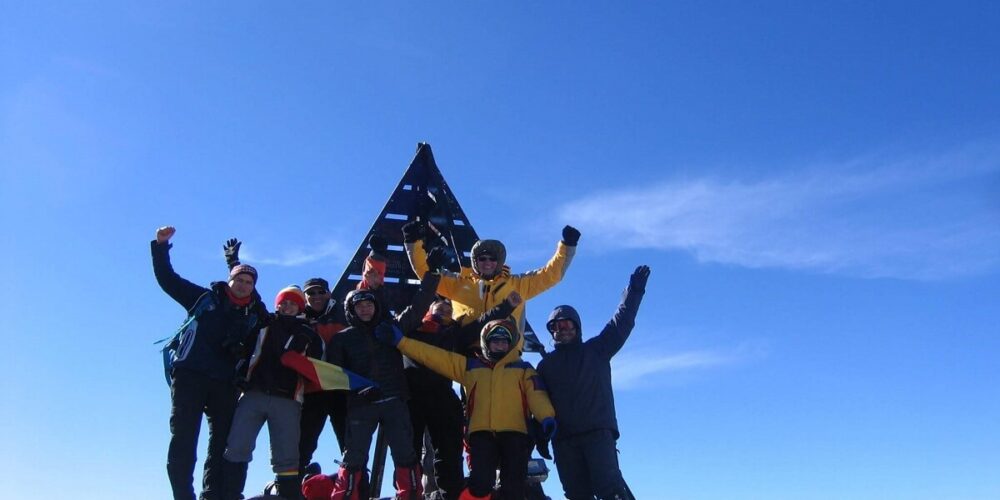 toubkal_summit_4167m group of people at the summit of toubkal
